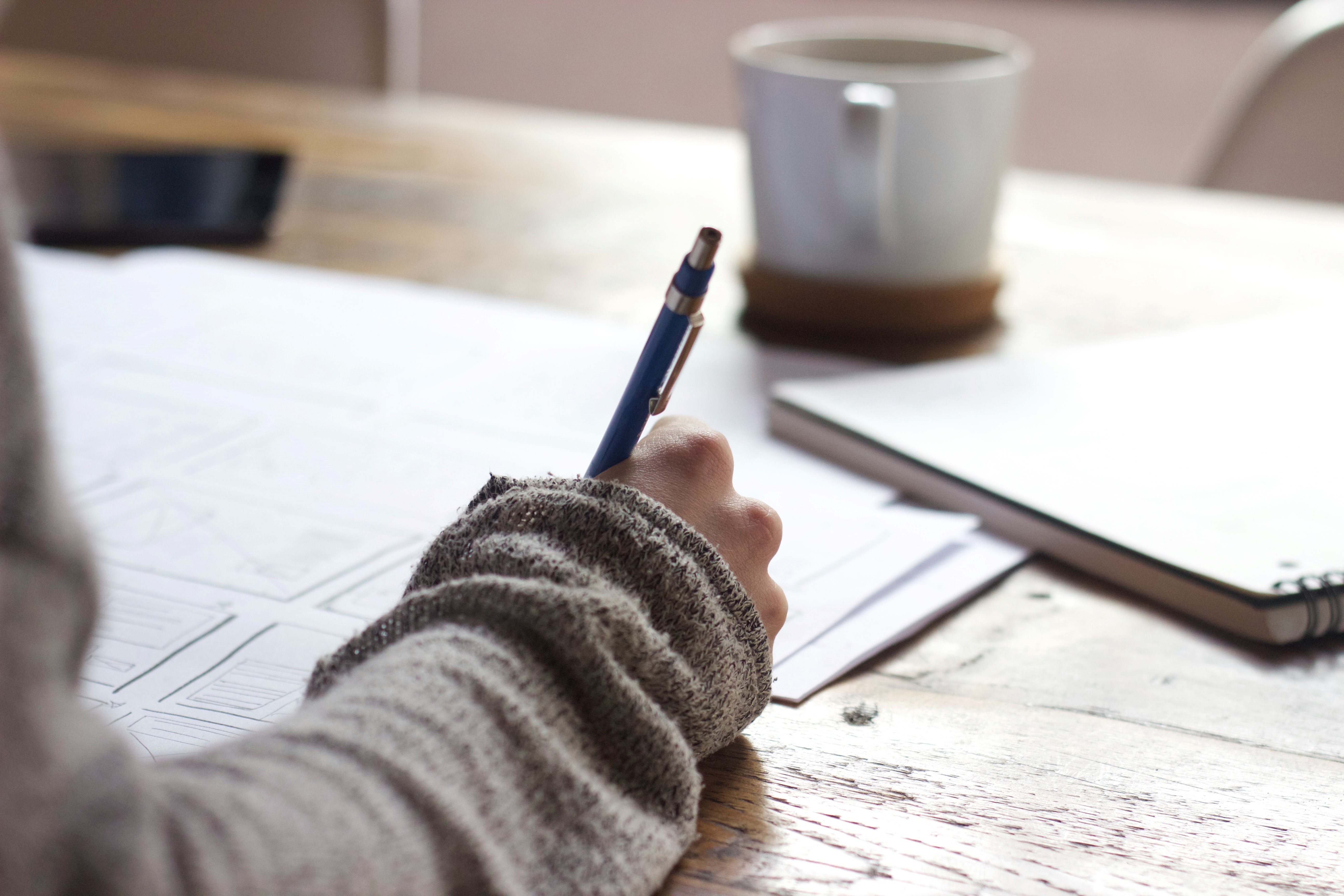 Girl writing on a notebook